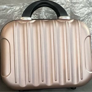 Hard shell, carry-on/train /cosmetic travel case. NWOT! Original packaging.